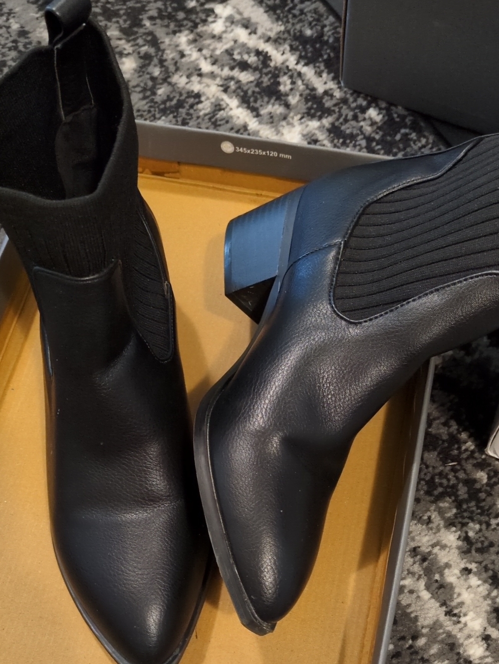 Modern Black Leather Ankle Booties with Elastic Side Panels